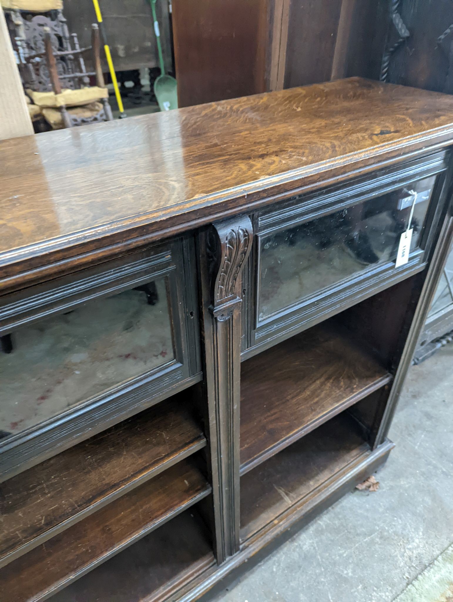 A late Victorian glazed oak bookcase, length 124cm, depth 38cm, height 112cm